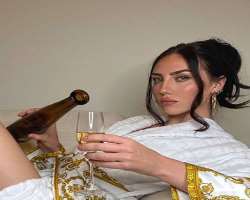 Sydney Carlson consuming alcohol